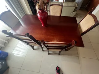 Coffee table, tv stand with 2 sides and 6 chairs and a table all for R8500