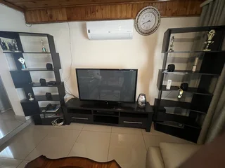 Coffee table, tv stand with 2 sides and 6 chairs and a table all for R8500