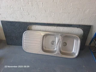 Double kitchen basin and granite top