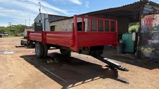 TRAILER WITH DROP-SIDES