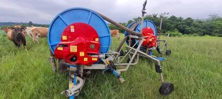 Ocmis And Bauer Traveling Irrigators