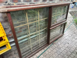 Windows - Wood With Glass And Burglar Bars