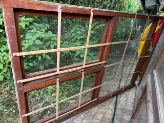 WINDOWS - WOOD WITH GLASS AND BURGLAR BARS