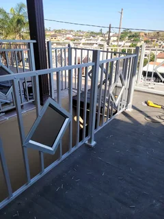 ALUMINUM WINDOWS DOORS SHOWERS BALUSTRADE