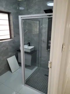 ALUMINUM WINDOWS DOORS SHOWERS GATES