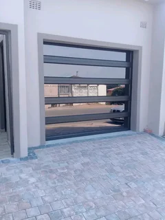 ALUMINUM WINDOWS DOORS SHOWERS