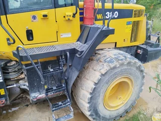 earth moving equipment   Cat and Komatsu