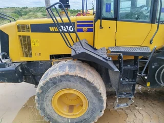 earth moving equipment   Cat and Komatsu