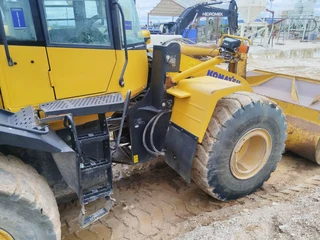 earth moving equipment   Cat and Komatsu