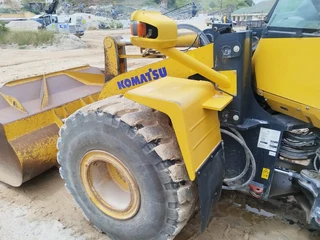 earth moving equipment   Cat and Komatsu