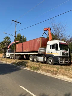 CRANE TRUCK -WE MOVE CONTAINERS -RIGG RENTAL