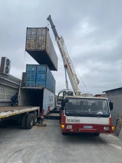 CRANE TRUCK -WE MOVE CONTAINERS -RIGG RENTAL