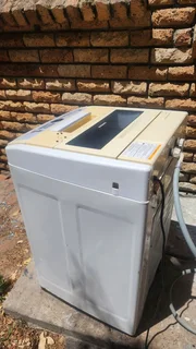 Samsung 8kg top loader washer in great working condition. R1000 all pipes included.