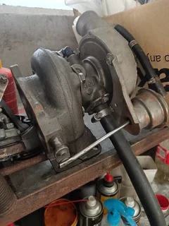 Turbocharger with top mount intercooler