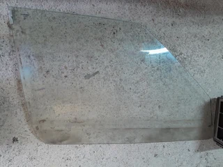 Fiat Uno spares for sale, Mia Left side window, reservoir for brakes and reservoir for water etc.