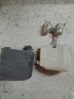 Fiat Uno spares for sale, Mia Left side window, reservoir for brakes and reservoir for water etc.