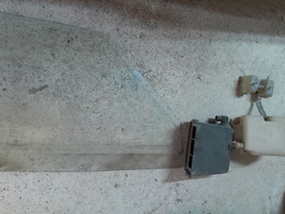 Fiat Uno spares for sale, Mia Left side window, reservoir for brakes and reservoir for water etc.