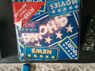 DSTV remote with cables, card and still working.