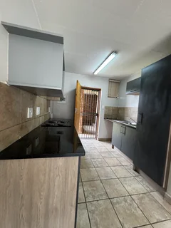 Modern 2-Bedroom Apartment — Villa Bianco, Rooihuiskraal North
