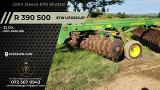 John Deere 670 Skottel 32 Dis