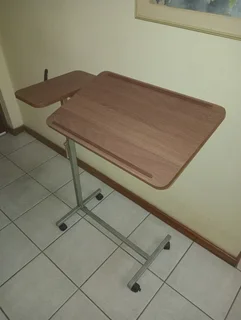 Overbed table on wheels