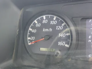 2007 ISUZU NQR500 (4 TON) WITH DROP SIDES BODY