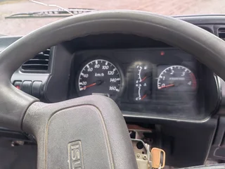 2007 ISUZU NQR500 (4 TON) WITH DROP SIDES BODY