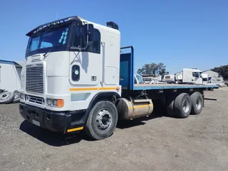 1995 FREIGHTLINER FLB100 6x4 (14 TON) WITH FLAT DECK BODY