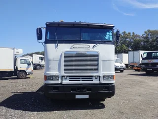 1995 FREIGHTLINER FLB100 6x4 (14 TON) WITH FLAT DECK BODY