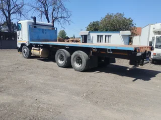 1995 FREIGHTLINER FLB100 6x4 (14 TON) WITH FLAT DECK BODY