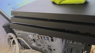 Playstaion 4 pro with game and 3 controls only R4500 non neg