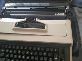 Adler electric typewriter in case