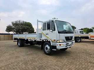 2012 Nissan UD90 Dropside truck for sale. Truck is in excellent condition