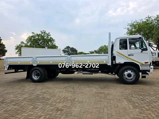2012 Nissan UD90 Dropside truck for sale. Truck is in excellent condition
