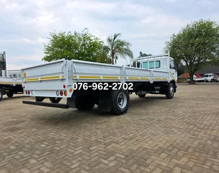 2012 Nissan UD90 Dropside truck for sale. Truck is in excellent condition