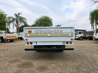 2012 Nissan UD90 Dropside truck for sale. Truck is in excellent condition