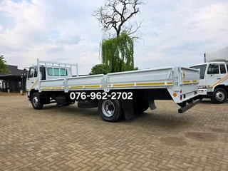 2012 Nissan UD90 Dropside truck for sale. Truck is in excellent condition