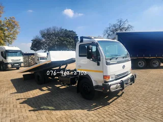 2010 Nissan UD40L Rollback with Hydraulic winch for sale