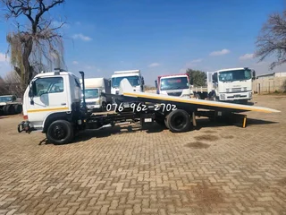 2010 Nissan UD40L Rollback with Hydraulic winch for sale