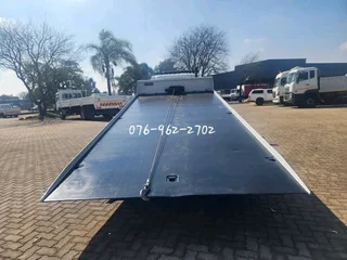 2010 Nissan UD40L Rollback with Hydraulic winch for sale