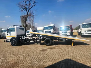 2010 Nissan UD40L Rollback with Hydraulic winch for sale