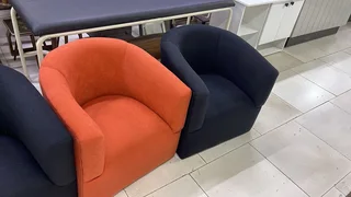 The Home Stores' Tub Chairs Assorted Colors In Orange And Black