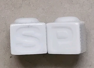 Porcelain salt and pepper shakers