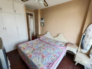 2 single beds with 2 side tables