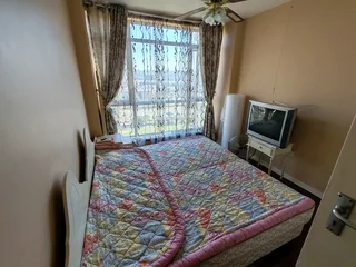 2 single beds with 2 side tables