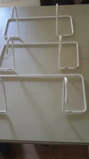 Three metal over door drying hangers in very good condition