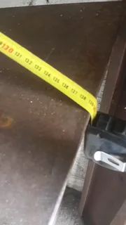 Three phase  disk sander which can accept wire brushes or polishing mops to opposite end good condit