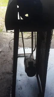 Three phase  disk sander which can accept wire brushes or polishing mops to opposite end good condit