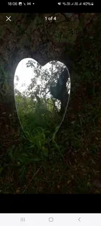 Heart shaped Vintage Mirror mounted hardwood