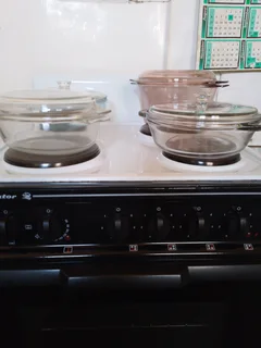 Ovenware, Pyrex Dishes and Anchor Hocking (Fire King),  large dishes with lid.